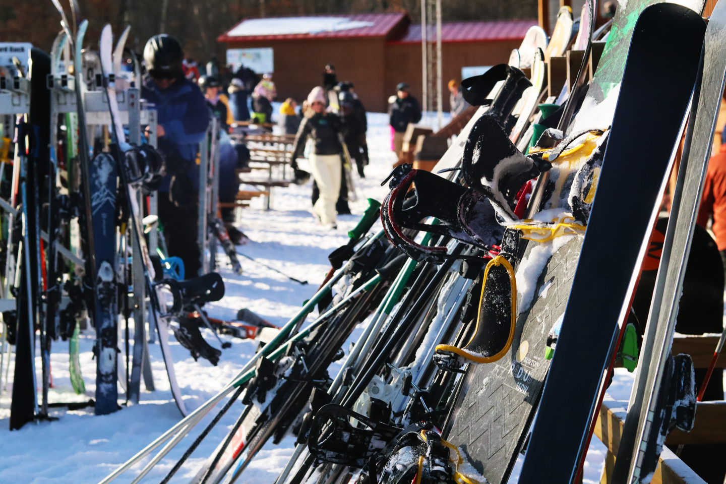 skis set up against ski rack